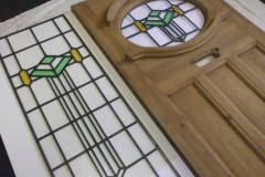 1930-s-stained-glass-front-doors1930-s-art-deco-original-exterior-door-in-green-and-amber-also-addtional-side-panel-a24251-1000x1000