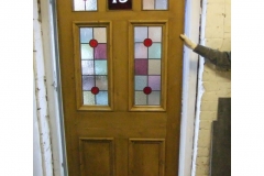 victorian-stained-glass-front-doorsvictorian-or-edwardian-7-panelled-door-with-soft-colour-toned-glass-and-central-number-a24104-1000x1000