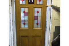 victorian-stained-glass-front-doorsvictorian-or-edwardian-7-panelled-door-with-soft-colour-toned-glass-and-central-number-a24107-1000x1000